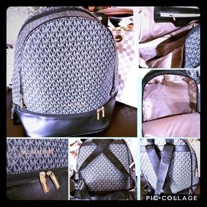 MK black and White backpack like brand new!